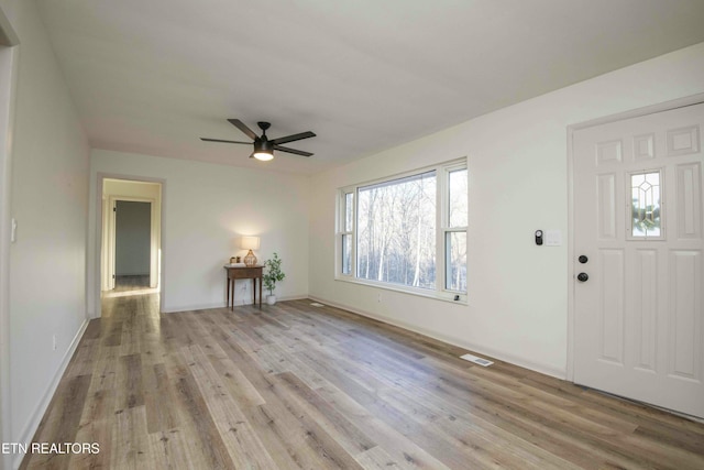 entrance foyer with light hardwood / wood-style flooring and ceiling fan