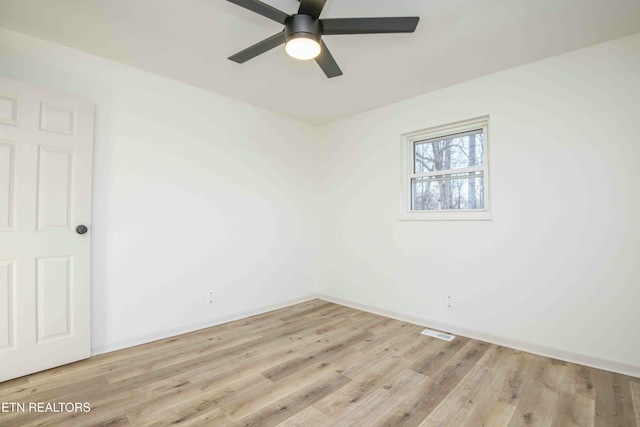 unfurnished room featuring light hardwood / wood-style flooring