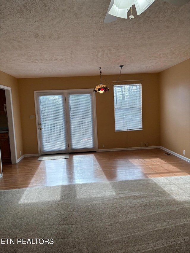 interior space featuring a textured ceiling