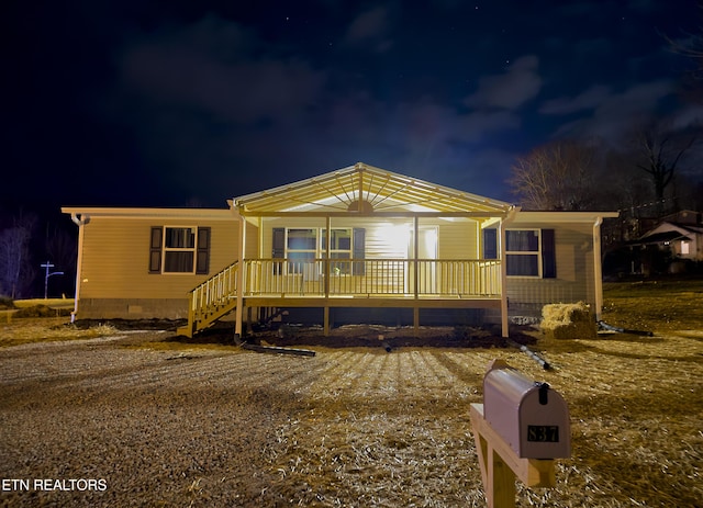 manufactured / mobile home featuring covered porch