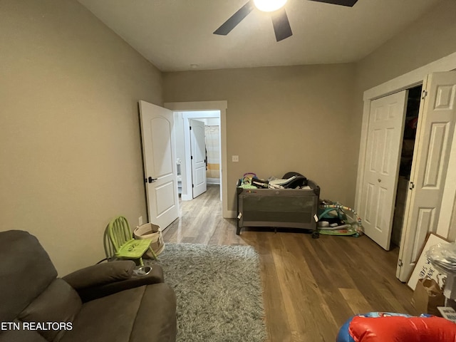 interior space featuring hardwood / wood-style floors and ceiling fan