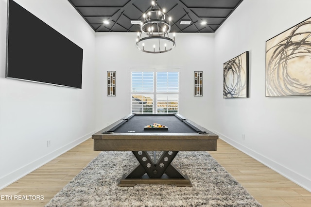 playroom with light hardwood / wood-style floors and pool table