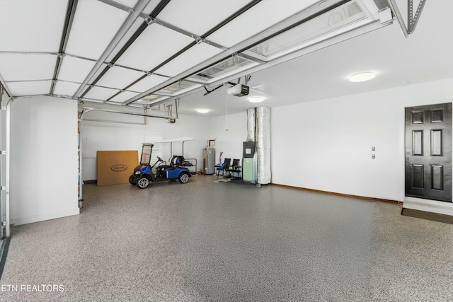 garage featuring water heater and a garage door opener