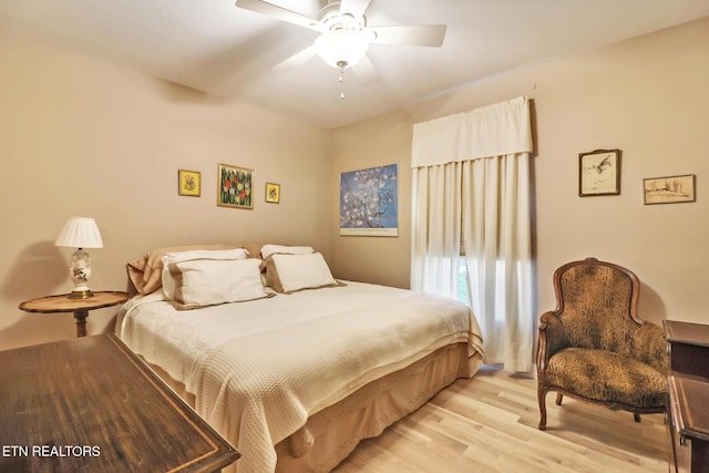 bedroom featuring a ceiling fan and light wood-style floors