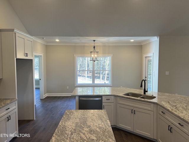 kitchen with sink, white cabinetry, dishwasher, and light stone counters