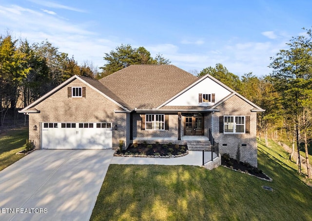 view of front of property featuring a front lawn, a garage, and a porch