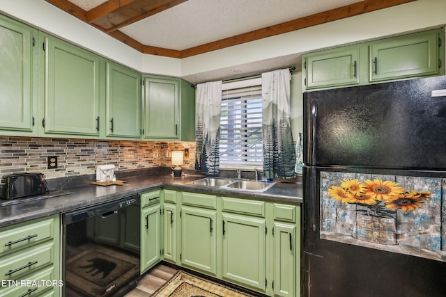 221 Woodland Rd Unit 210, Gatlinburg, TN 37738 - kitchen with black appliances, a sink, tasteful backsplash, and light wood-type flooring