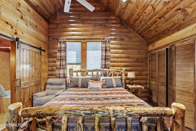 bedroom with ceiling fan, high vaulted ceiling, a barn door, and log walls