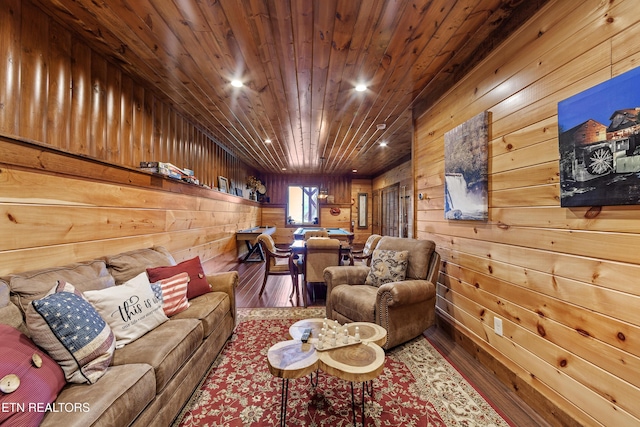 living room with wooden walls