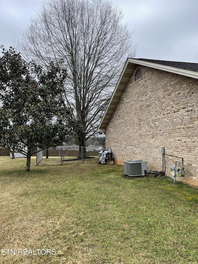 view of yard featuring central AC