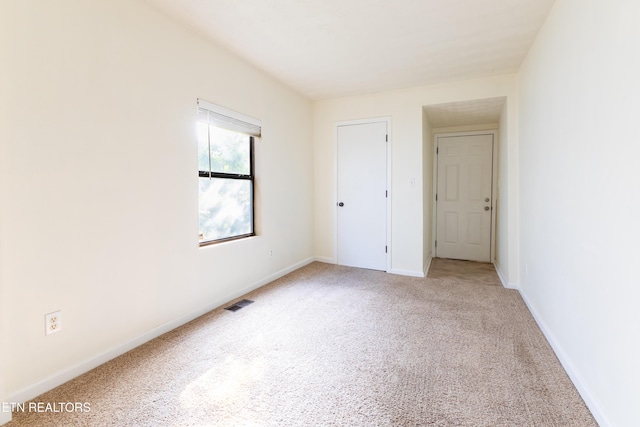 unfurnished bedroom featuring carpet floors