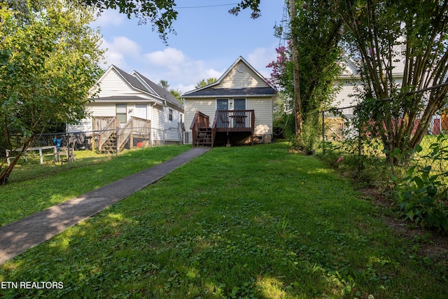 exterior space with a yard and a deck