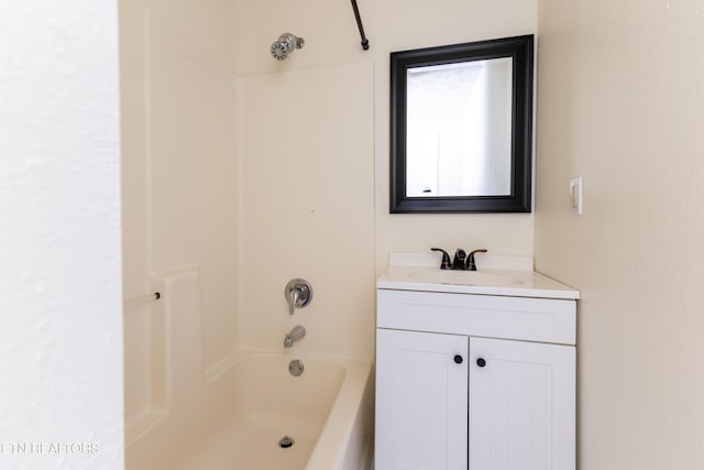 bathroom featuring vanity and tub / shower combination