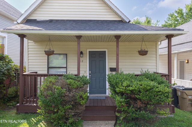 doorway to property with a porch