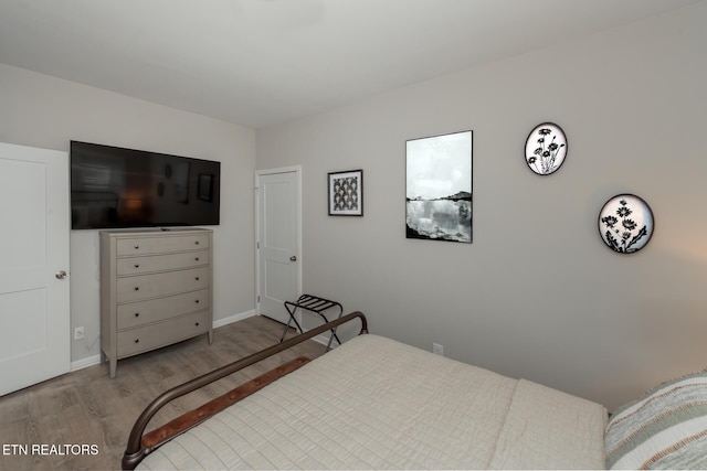 bedroom featuring light hardwood / wood-style floors