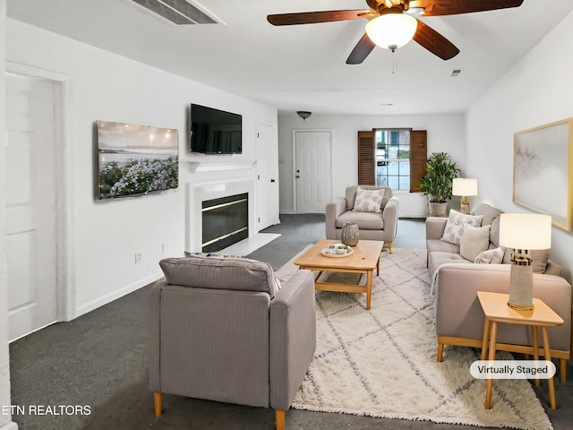 living room with ceiling fan