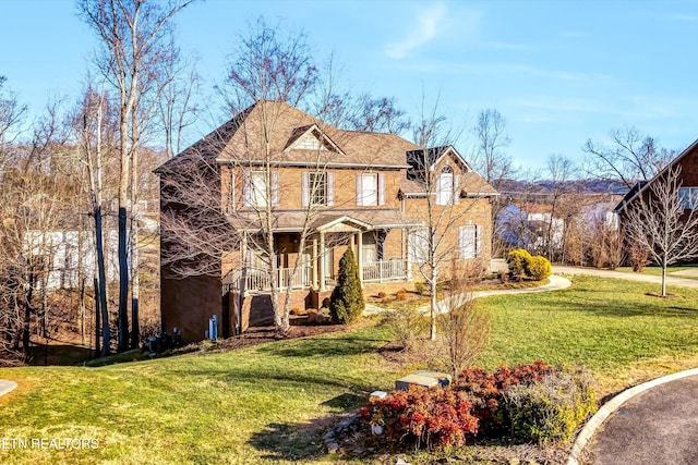 view of front of property with a front lawn