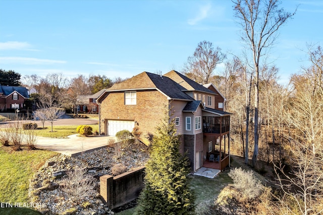 view of property exterior featuring a garage