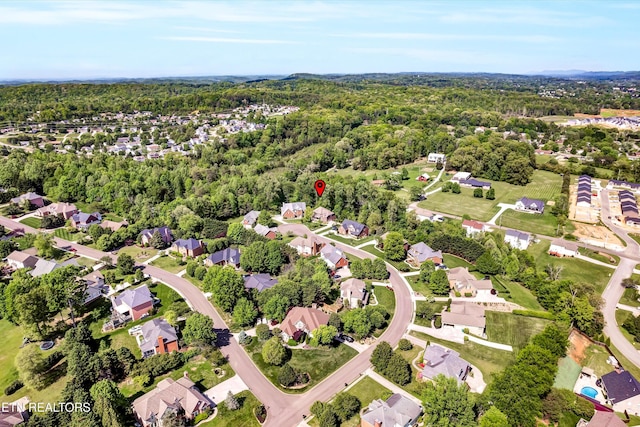 bird's eye view with a residential view and a forest view