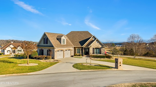 view of front facade featuring a garage and a front yard