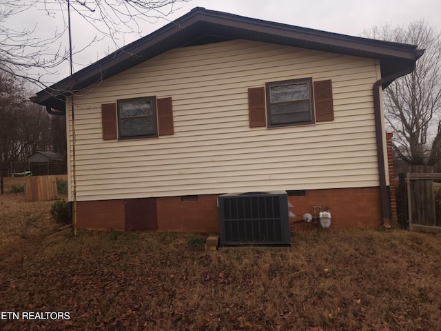 view of home's exterior featuring central AC unit