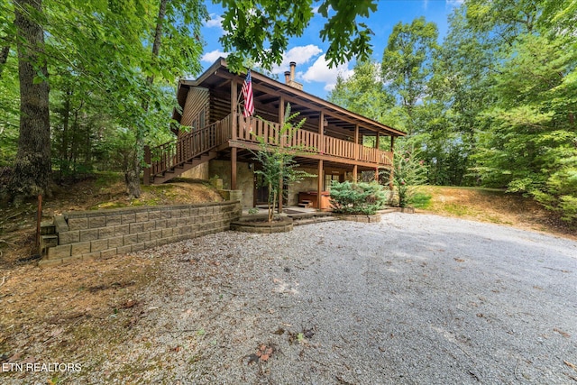 view of front of house featuring a deck