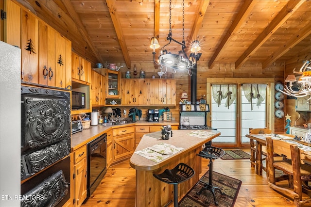 kitchen with wood ceiling, light hardwood / wood-style floors, lofted ceiling with beams, a kitchen island, and wood walls