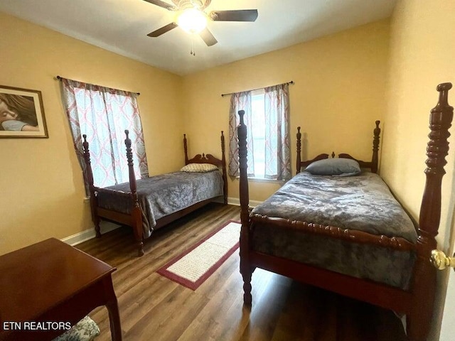 bedroom featuring ceiling fan and hardwood / wood-style floors