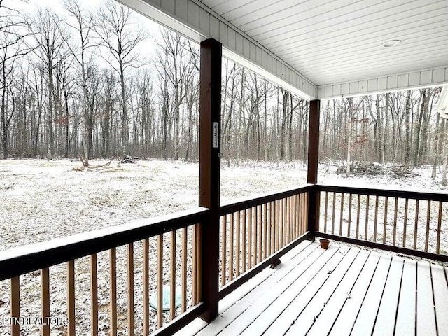 view of snow covered deck