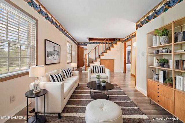 living room with dark hardwood / wood-style floors