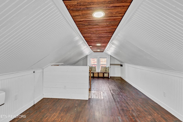 bonus room featuring vaulted ceiling, wood ceiling, and dark hardwood / wood-style flooring