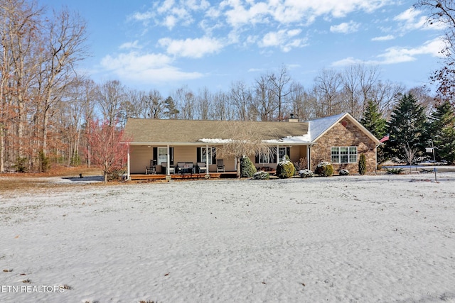 ranch-style home with a porch