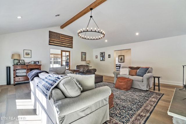 living room with wood-type flooring and vaulted ceiling with beams