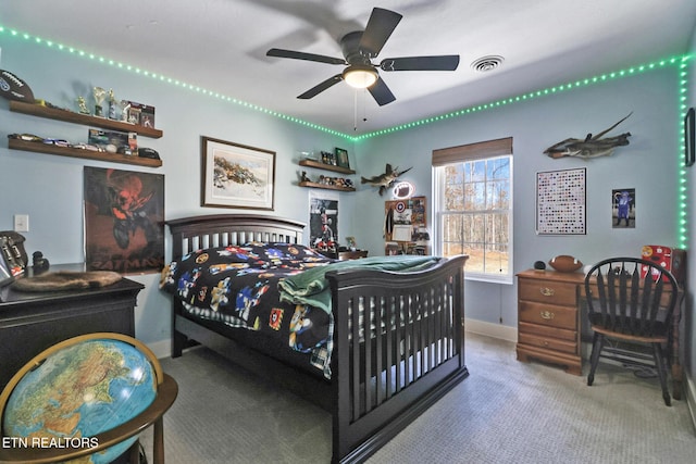 carpeted bedroom with ceiling fan