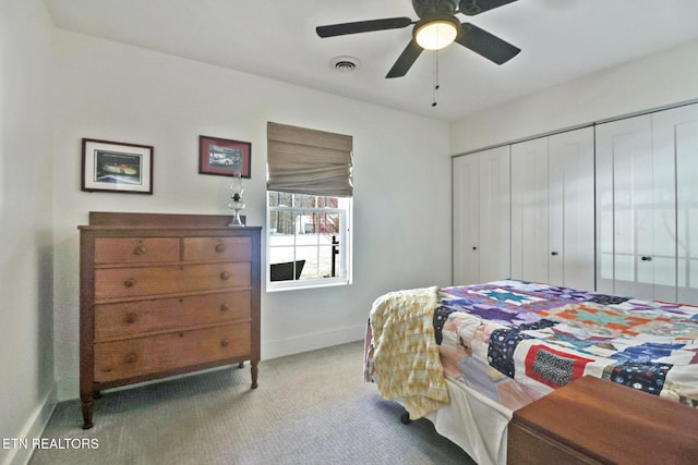 carpeted bedroom with ceiling fan