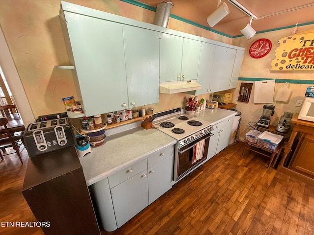 kitchen featuring white cabinetry, dark hardwood / wood-style floors, and electric stove