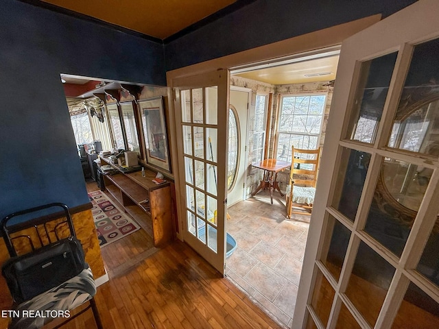 interior space featuring wood-type flooring and french doors