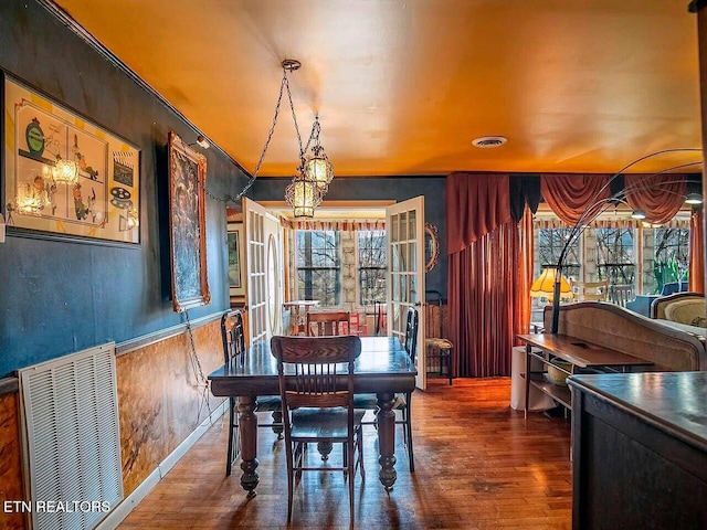 dining area featuring hardwood / wood-style flooring