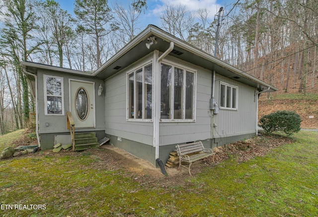 view of front of house featuring entry steps and crawl space