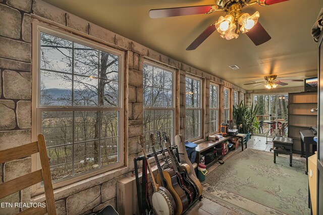 sunroom featuring visible vents