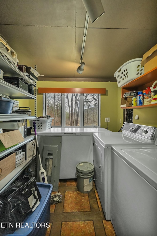 laundry area featuring a wealth of natural light, laundry area, and washing machine and clothes dryer