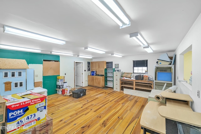 miscellaneous room featuring light wood-style floors