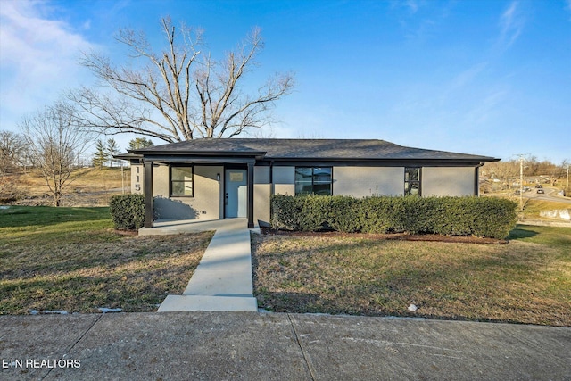 view of front of house with a front lawn