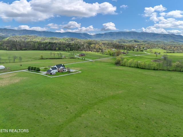 bird's eye view featuring a rural view and a mountain view