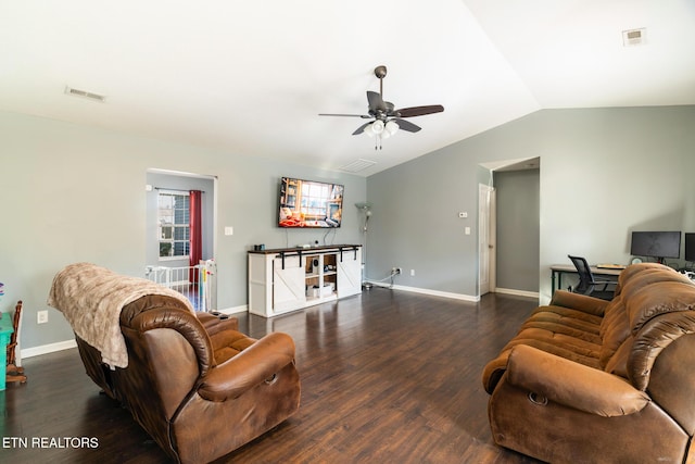 living room featuring ceiling fan, lofted ceiling, and dark hardwood / wood-style flooring