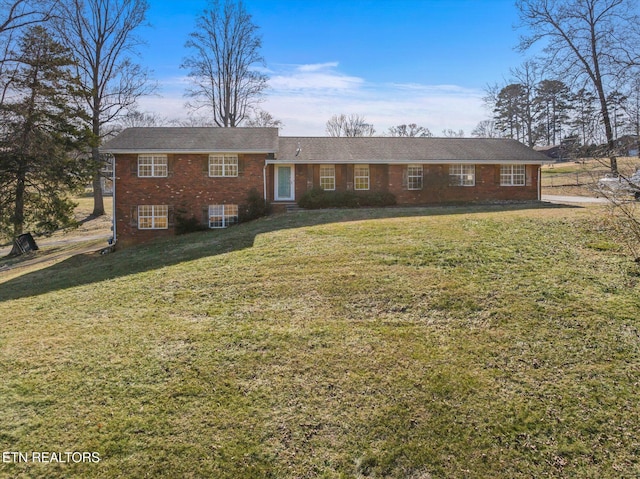 view of front of home with a front lawn