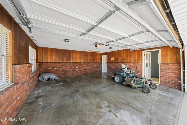 garage with wood walls