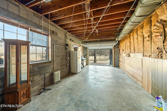 view of horse barn with radiator heating unit