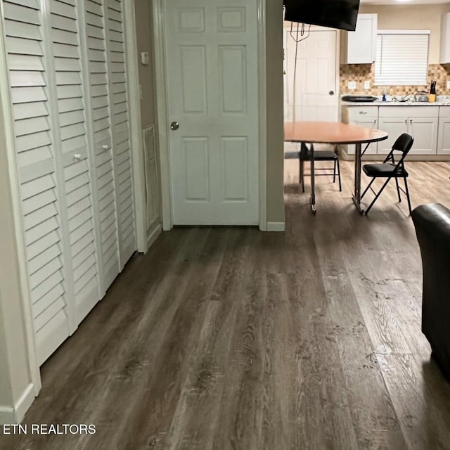 dining room with dark hardwood / wood-style floors