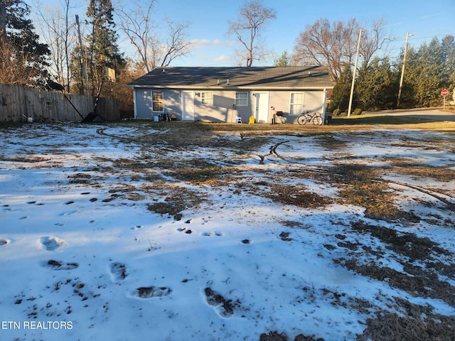 view of snow covered property